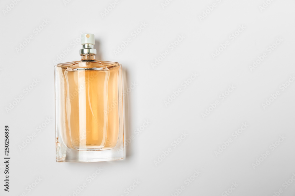 Bottle of perfume on white background