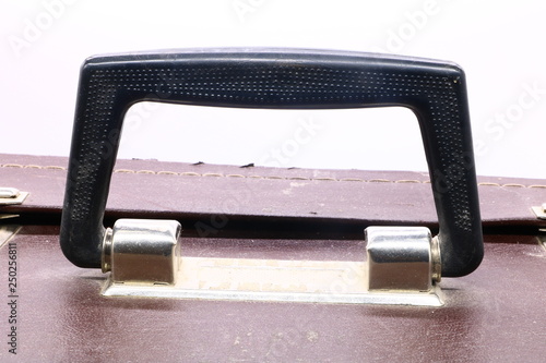close up old vintage suitcase handle