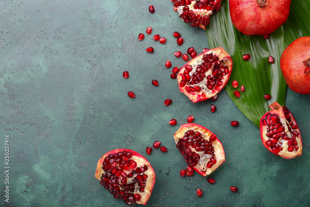 Ripe pomegranates on color background Ripe pomegranates on color background
