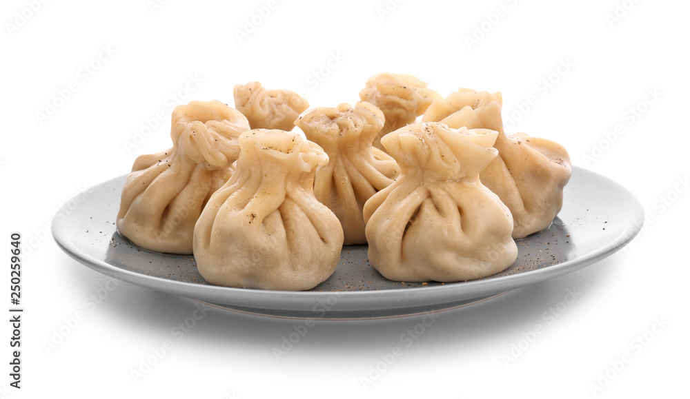 Plate with tasty dumplings on white background Plate with tasty dumplings on white background