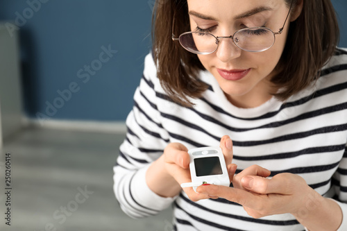 Diabetic woman measuring bl...