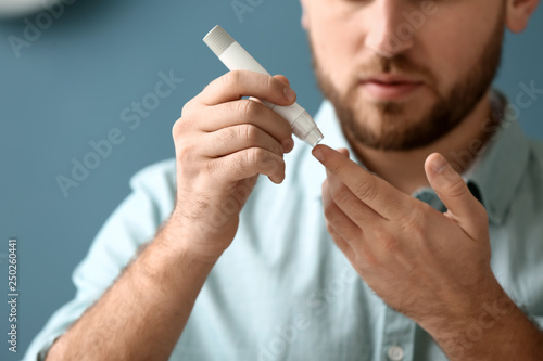 Diabetic man taking blood s...