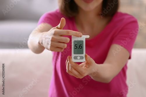 Diabetic woman measuring bl...
