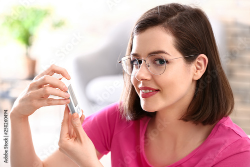 Diabetic woman measuring bl...