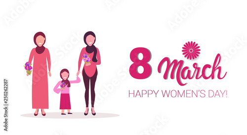 Three generations Arab women in hijab holding