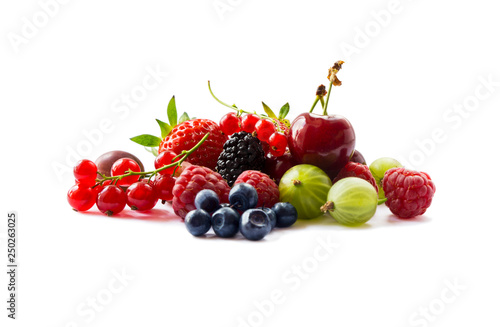 Fruits and berries isolated on white background. Ripe currants, raspberries, cherries, strawberries, gooseberries, mulberries and bilberries. Background of mix fruits with copy space for text.