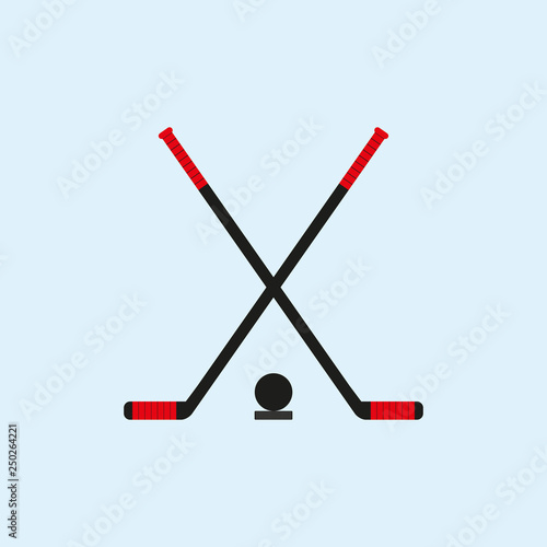Crossed hockey sticks and pucks. Vector illustration.