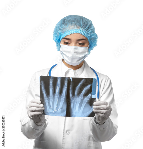 Female doctor studying X-ra...