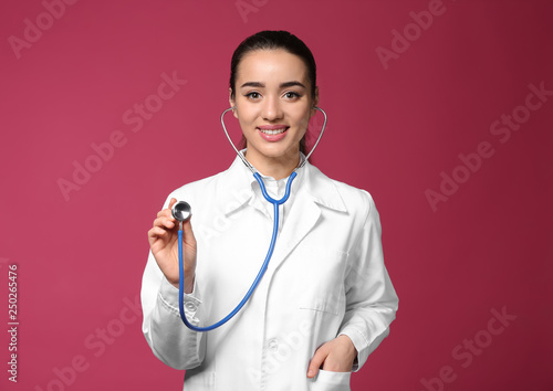 Female doctor using stethos...