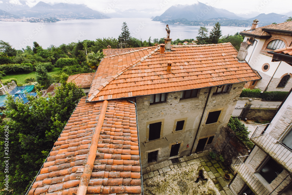 Look from above at orange roof of old Italian estate