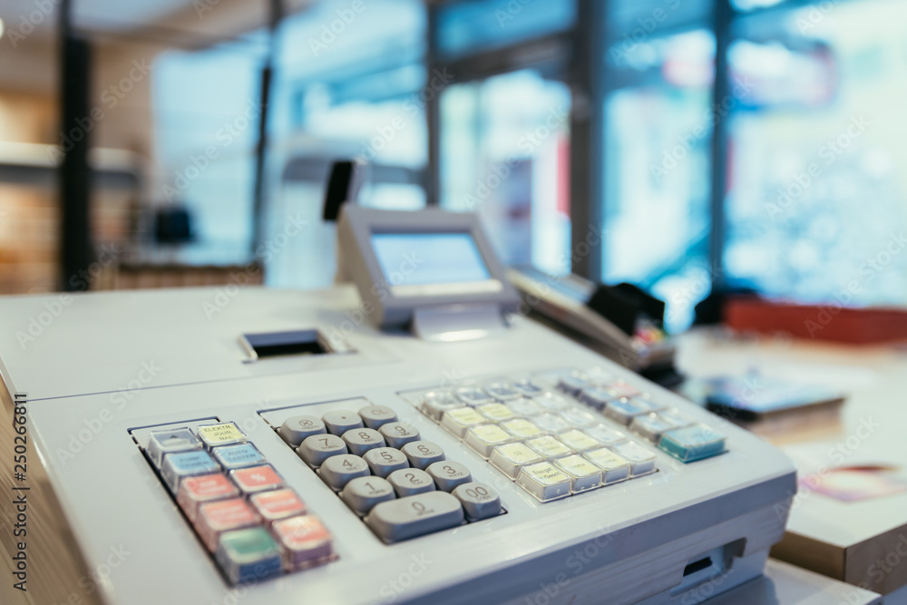 Cash register in a store, sales; Blurry Background Cash register in a store, sales; Blurry Background