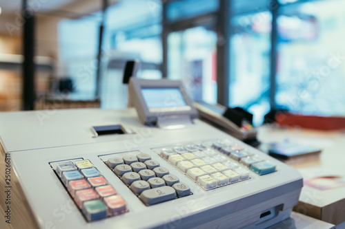 Cash register in a store, sales; Blurry Background photo