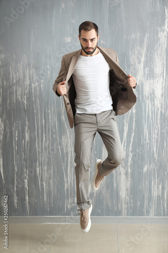 Handsome fashionable man ju...