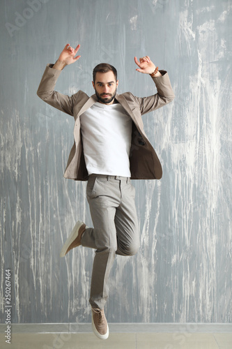 Handsome fashionable man ju...