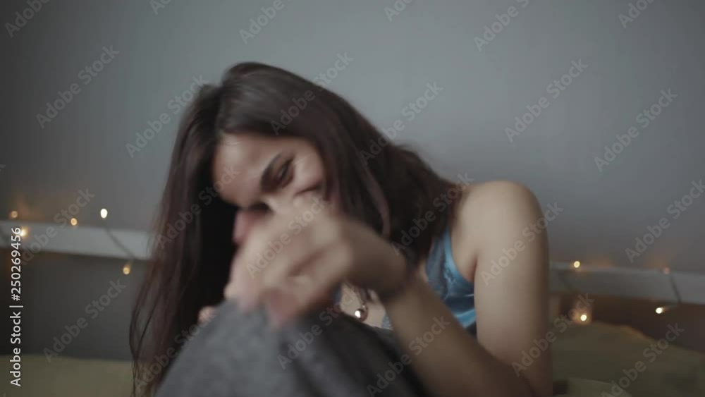 Girl is embarrassed in bed Girl is embarrassed in bed