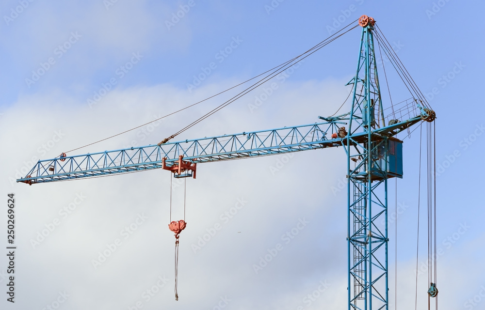 Lifting faucet on a background sky