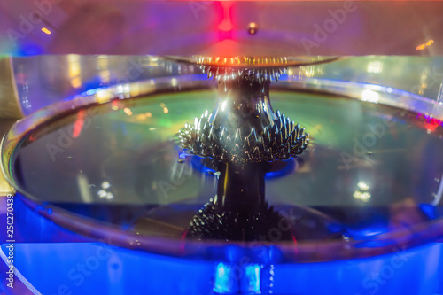 ferromagnetic fluid magnetized by a magnet in a science museum photo