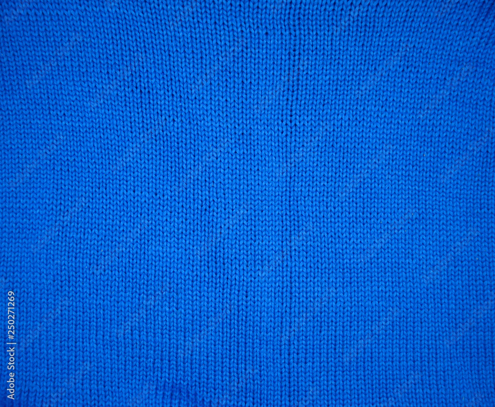Blue knitted pattern background Blue knitted pattern background