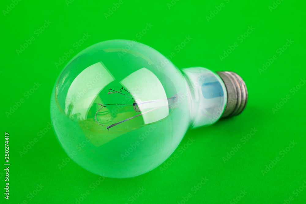 Lamp. The concept of energy conservation, earth day. The subject of technology and electrical theme Lamp. The concept of energy conservation, earth day. The subject of technology and electrical theme