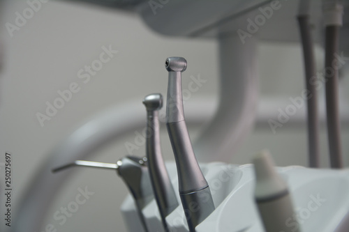 Close-up of dentist working with a modern dentist tools