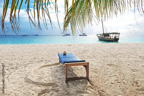 Ocean view on paradise Zanzibar island out of palm leaves