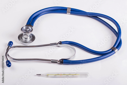 Stethoscope or phonendoscope  thermometer  medical device for auscultation  medical equipment on a white background.