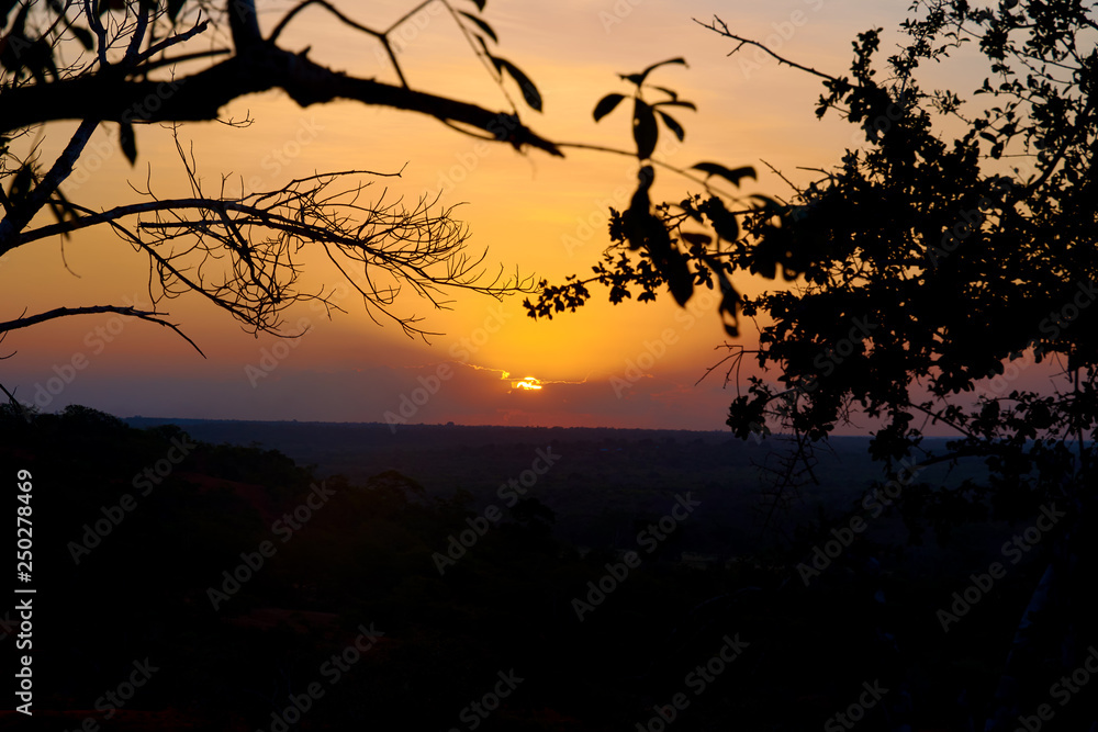 Fototapeta premium A view of the sunset over the Marafa canyon in Kenya, Africa. Landscape and safari under evening sky.