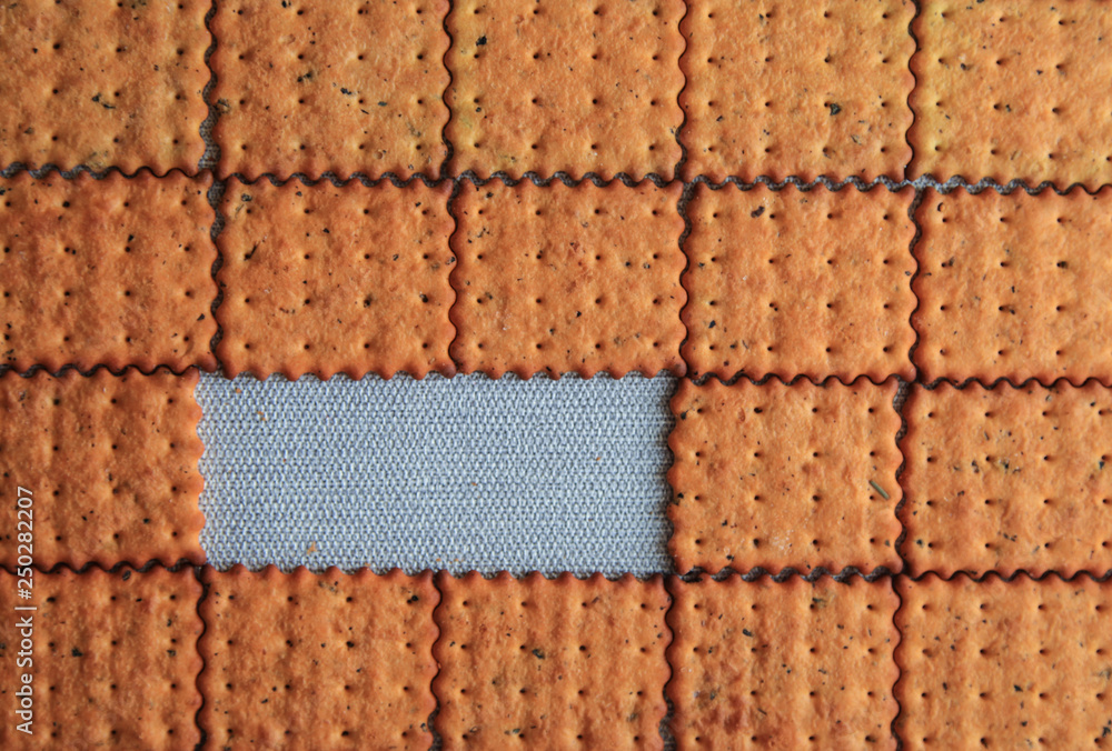 Fototapeta premium Crackers - salty background with basil and tomato. Cooking and Food