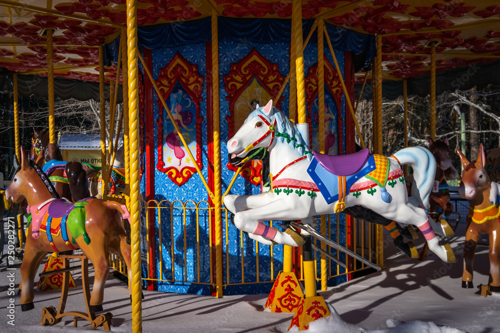 Carousel in the children's Park with horses