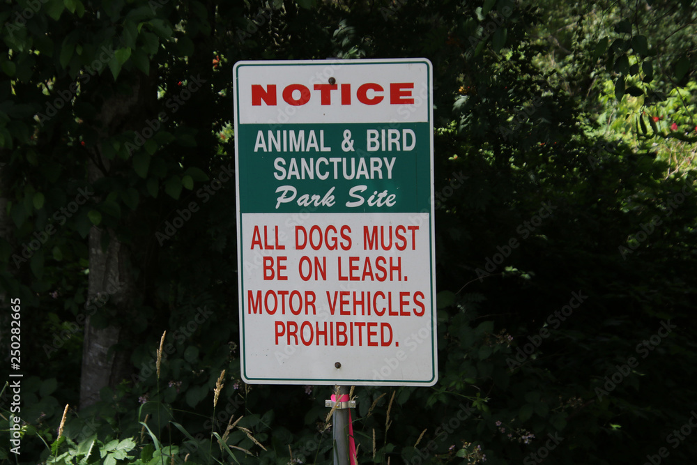 A sign stating that this is an animal and bird sanctuary