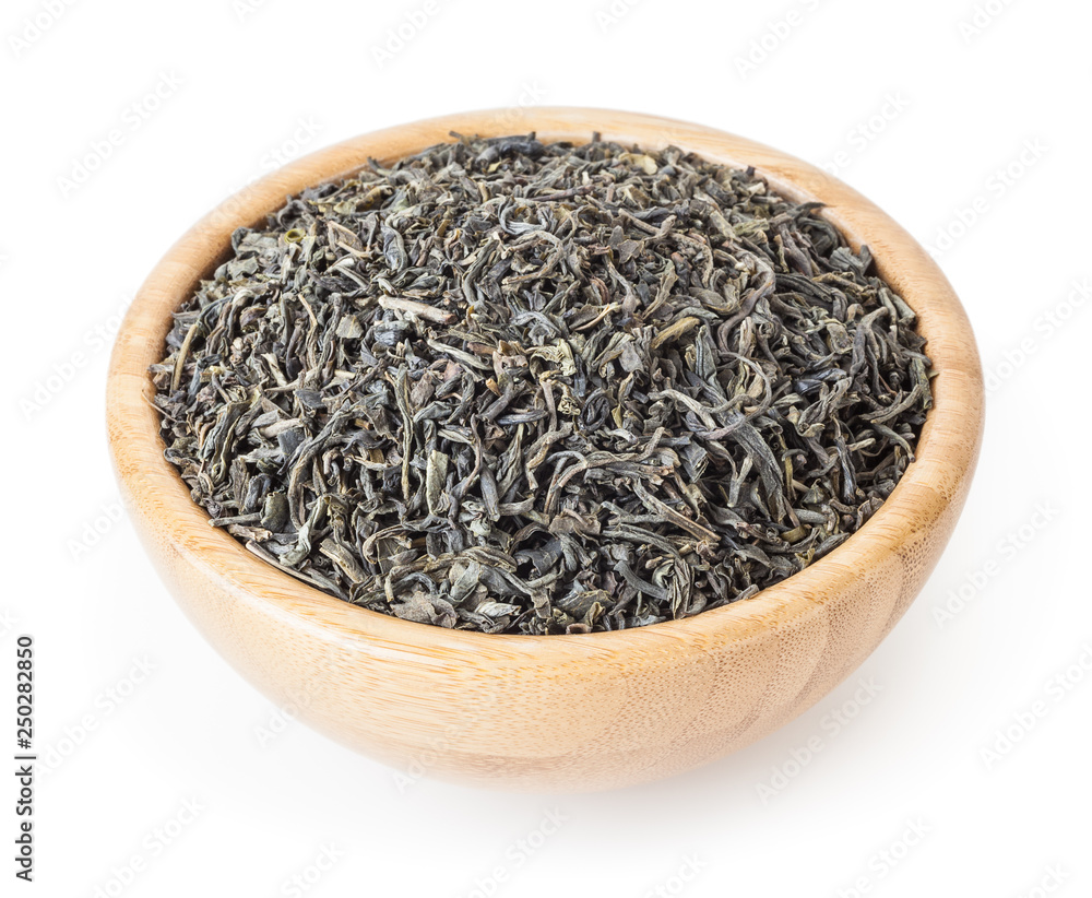 Green tea in wooden bowl isolated on white background with clipping path Green tea in wooden bowl isolated on white background with clipping path