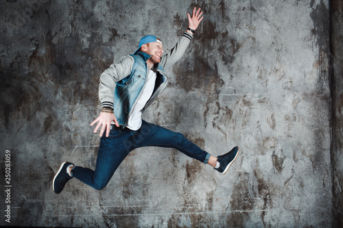 Fototapeta Naklejka Na Ścianę i Meble -  Young male jumping