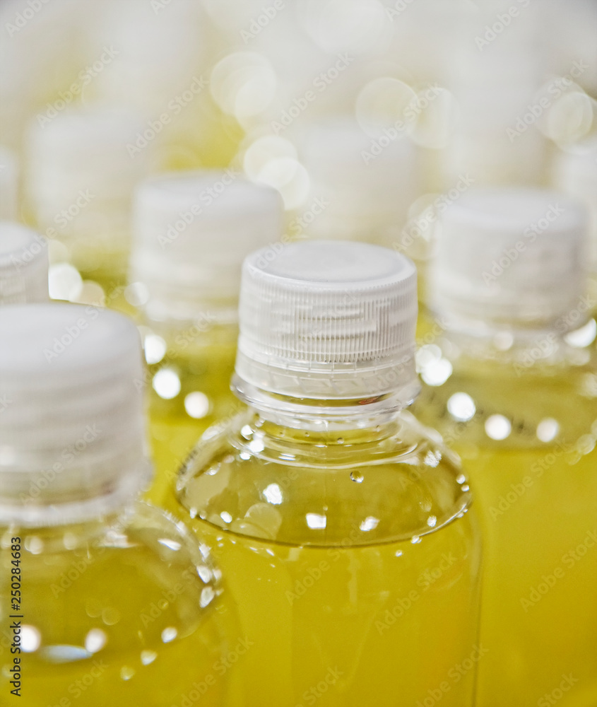 Close up of juice in plastic bottles Close up of juice in plastic bottles