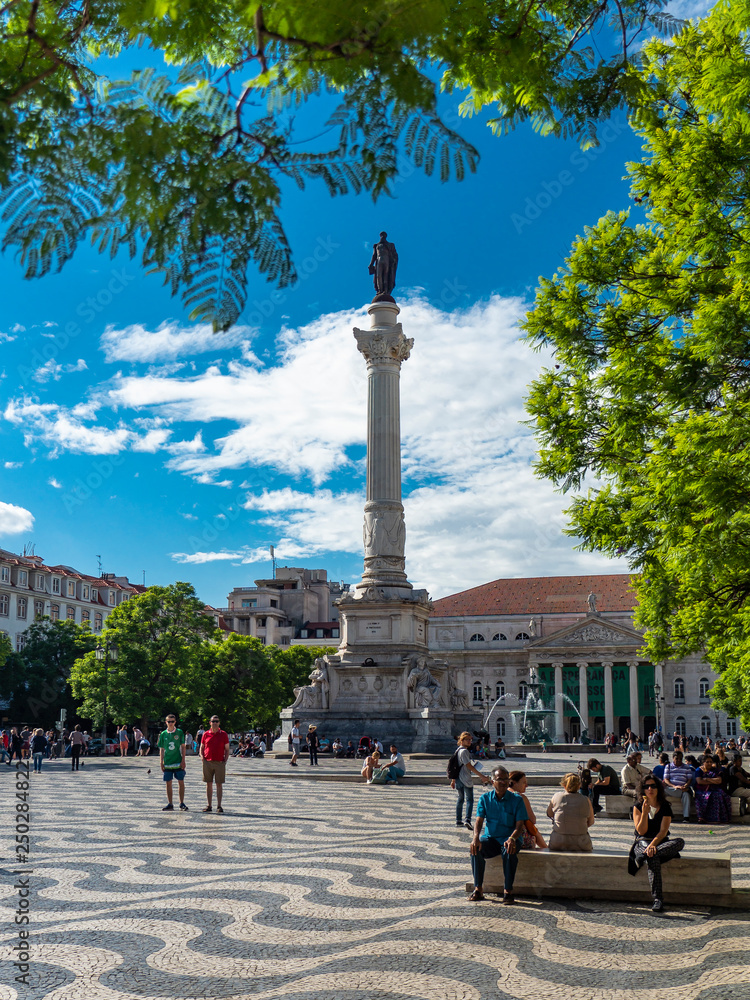 Rossio square and monument Dom Pedro IV, behind the National Theater, Lisbon, Portugal