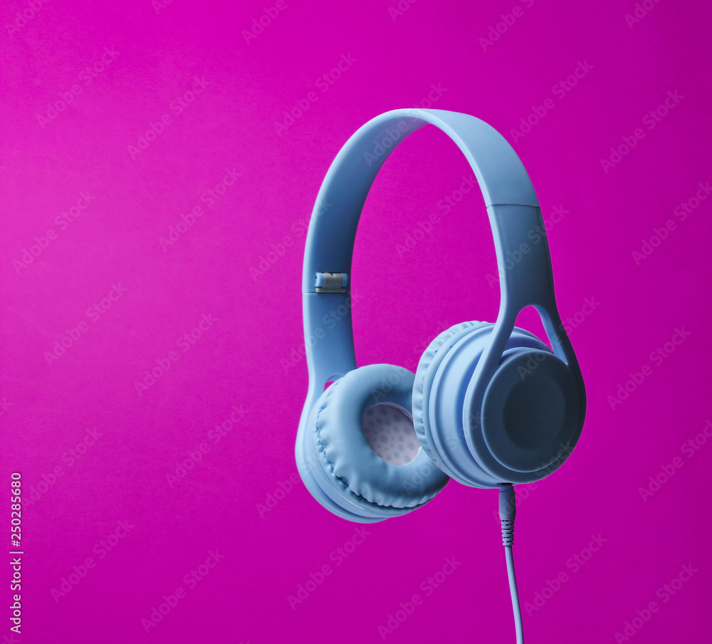 3D surround photo of modern headphones on pink background. Copy space. 3D surround photo of modern headphones on pink background. Copy space.