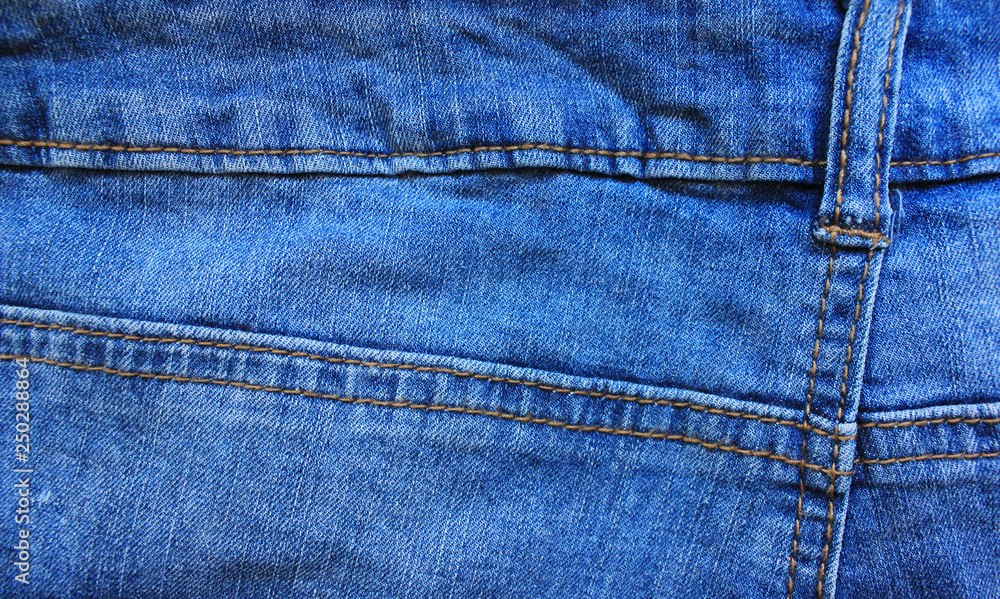 Blue Denim Jeans Design Detail with Seams Close Up Top View. Classic Fashion Jeans Natural Pattern, Simple Canvas of Empty Light Blue Denim Jean Fabric Background for Copy Space or Template Blue Denim Jeans Design Detail with Seams Close Up Top View. Classic Fashion Jeans Natural Pattern, Simple Canvas of Empty Light Blue Denim Jean Fabric Background for Copy Space or Template