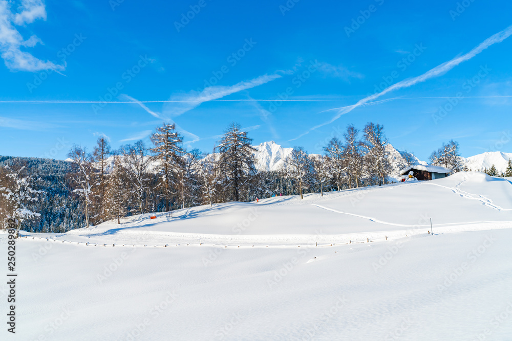 Winter landscape with with snow covered Alps in Seefeld in the Austrian state of Tyrol. Winter in Austria Winter landscape with with snow covered Alps in Seefeld in the Austrian state of Tyrol. Winter in Austria