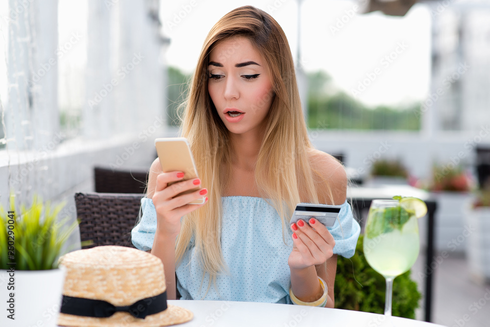 custom made wallpaper toronto digitalBeautiful girl summer cafe, smartphone plastic credit card. Emotions of surprise disappointment, shocked. Payment of check restaurant via Internet mobile app. Concept large amount card debit in bank.