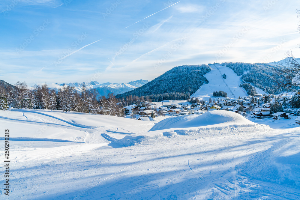 Winter landscape with with snow covered Alps and ske slope in Seefeld in the Austrian state of Tyrol. Winter in Austria Winter landscape with with snow covered Alps and ske slope in Seefeld in the Austrian state of Tyrol. Winter in Austria