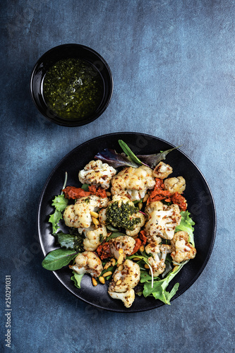 Cauliflower steamed with lettuce and pesto