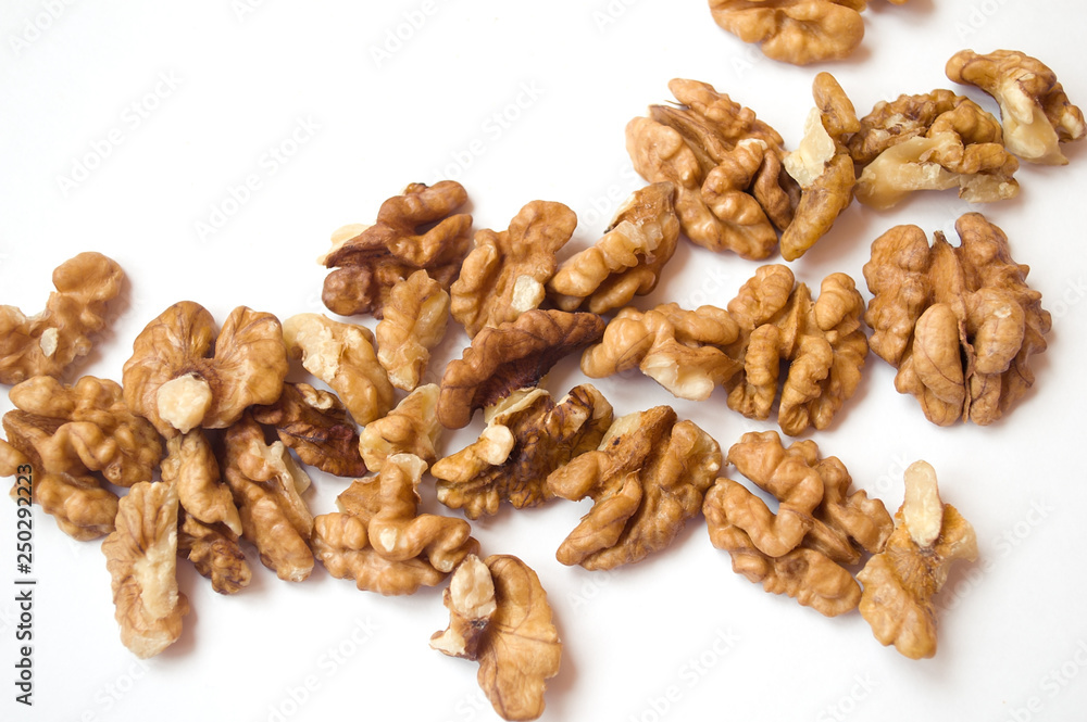 walnuts on a white background. banner about diet and healthy eating walnuts on a white background. banner about diet and healthy eating