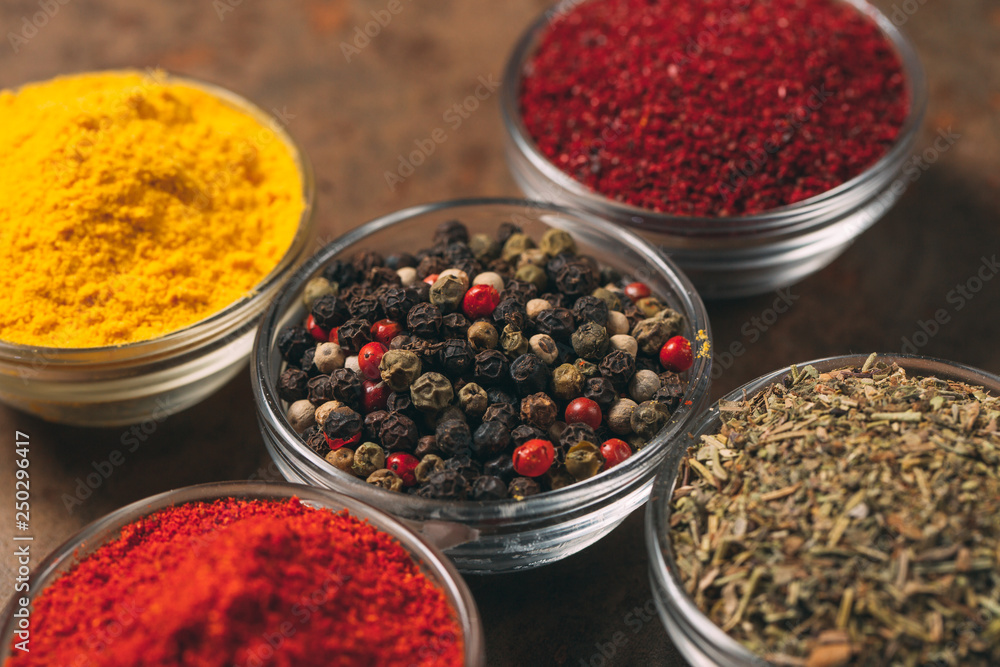 The Different Spices. Spices on stone background. The Different Spices. Spices on stone background.