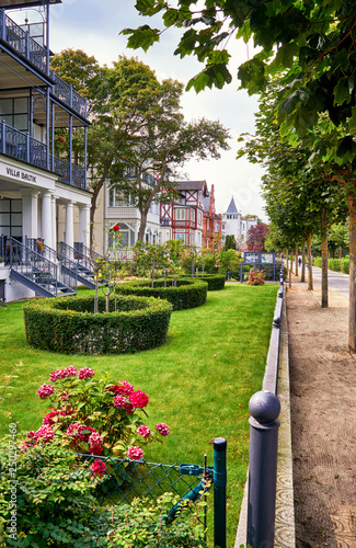Historic houses with front garden on the beach promenade in Binz. Summer city on the Baltic Sea coast. R  gen is a popular tourist destination. Germany