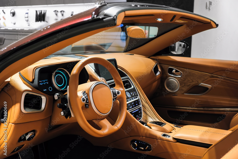 View of the interior of a modern automobile showing the dashboard. View of the interior of a modern automobile showing the dashboard.