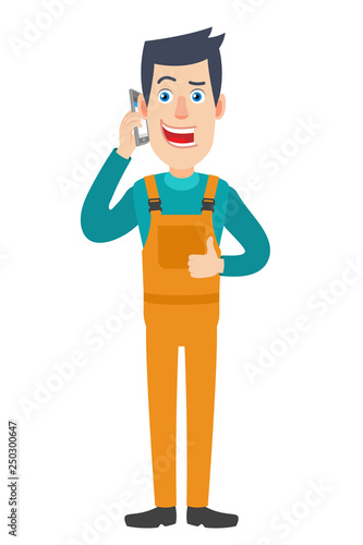 Worker talking on mobile phone and showing thumb up