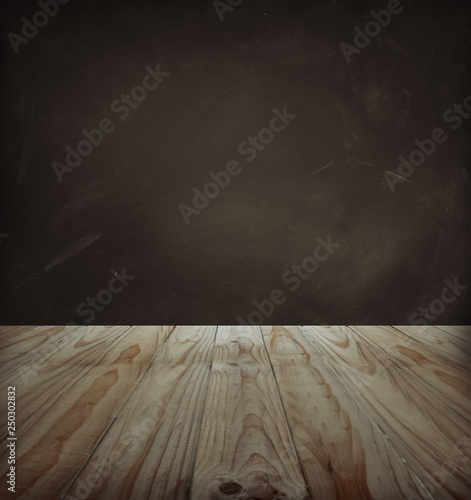 Wooden floor boards and blank wall