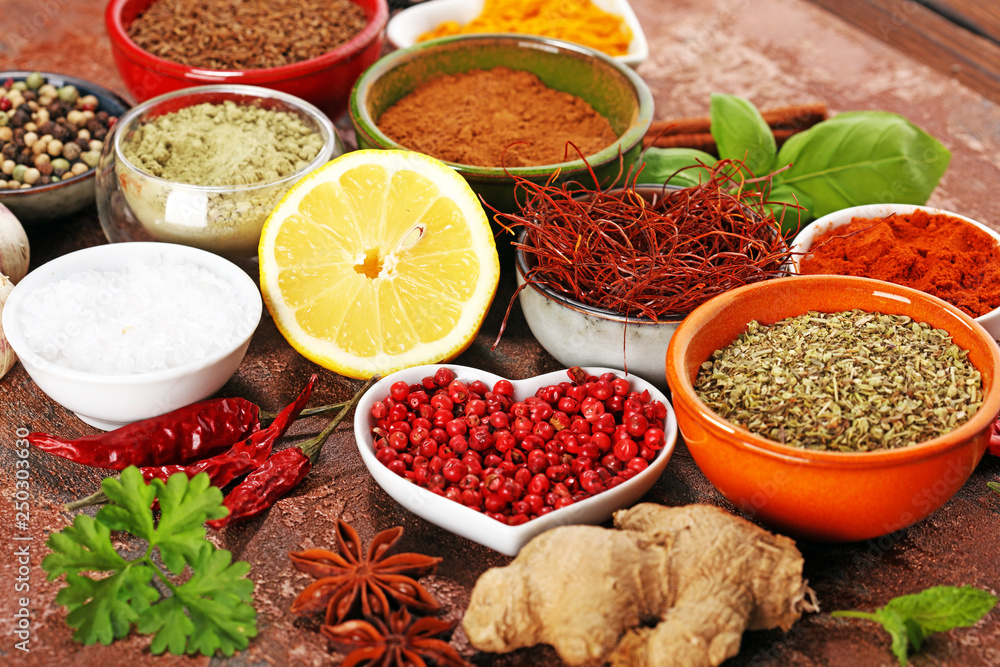Fototapeta Spices and herbs on table. Food and cuisine ingredients.