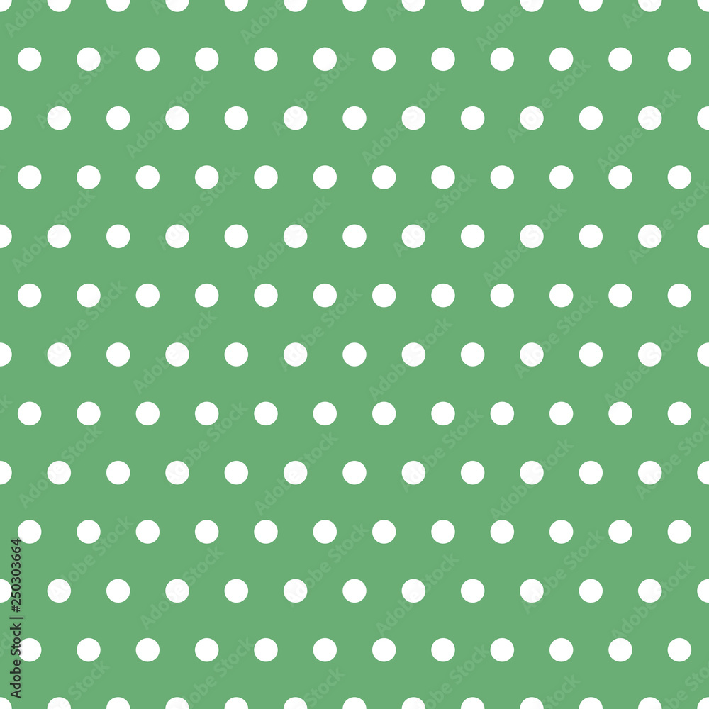 Seamless dotted pattern with white dots on green spring background color