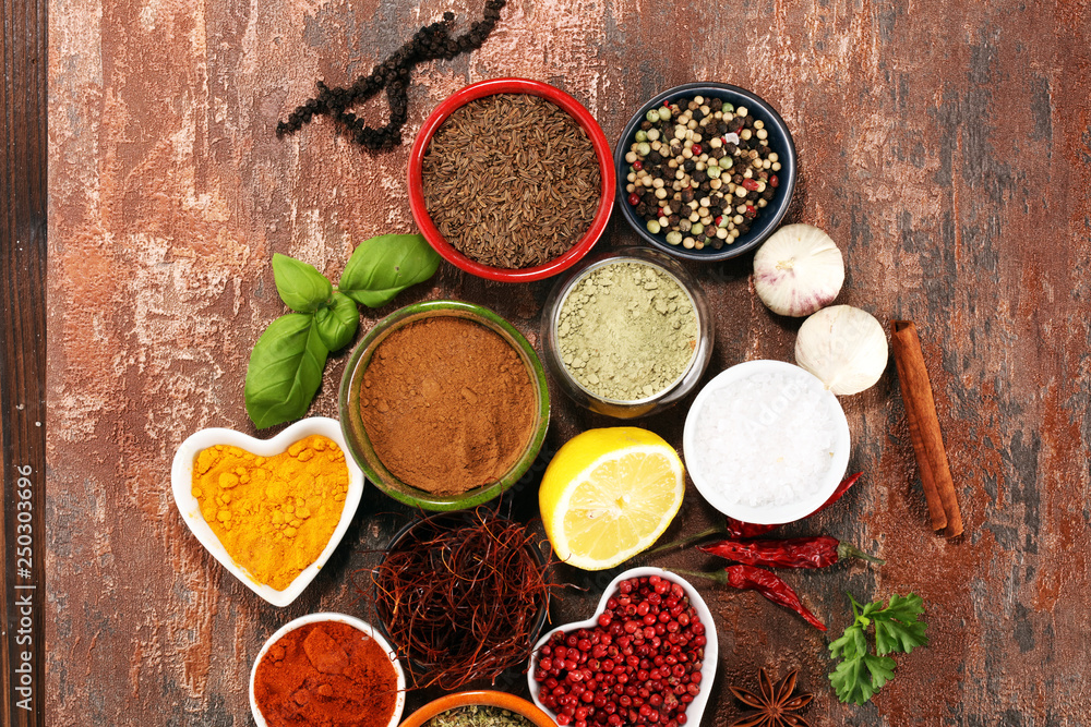 Fototapeta premium Spices and herbs on table. Food and cuisine ingredients.