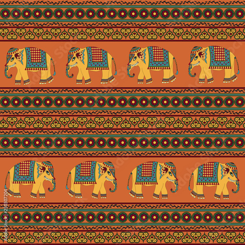 Indian traditional pattern with elephants on orange background. Seamless pattern